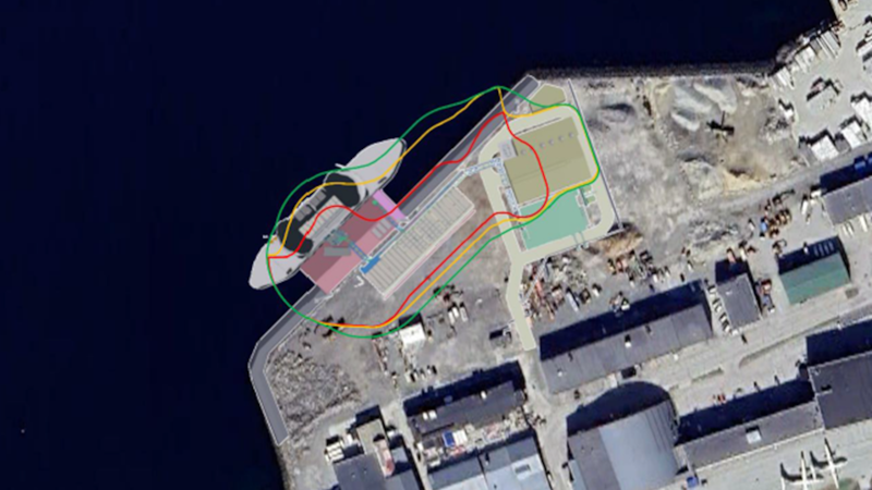 Flyfoto over område med risikokonturer markert med røde og gule streker