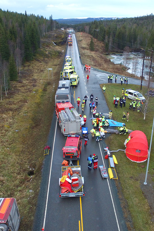 Emergency vehicles parked on road during exercise