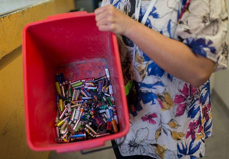 Plastic tray with used batteries